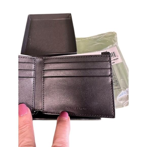 NWT Michael Kor Slim Billfold.  Black with Michael Kor emblem on front & back. - Picture 2 of 6